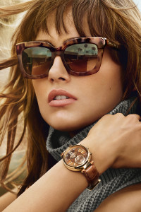 An ad visual from the MICHAEL Michael Kors fall 2015 campaign featuring Karmen Pedaru and Benjamin Eidem.